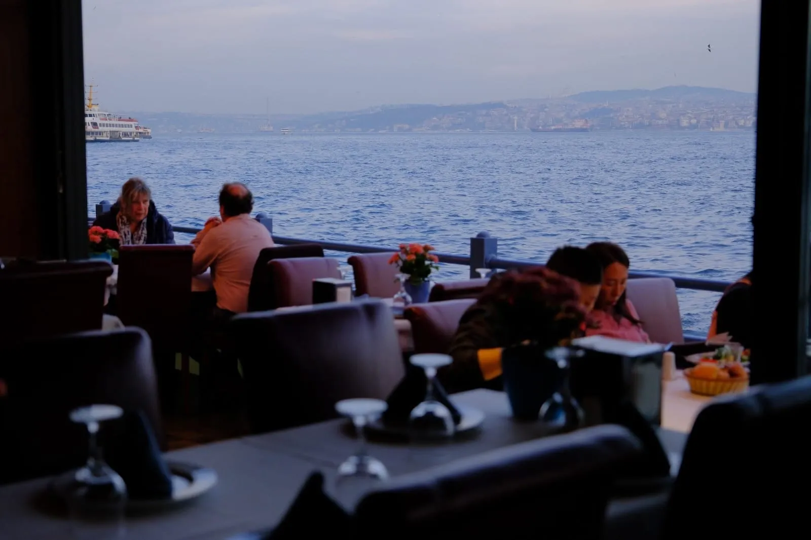 Waterfront tables in the early evening