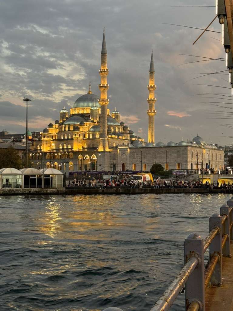 The New Mosque and the Golden Horn at dusk, seen from the Eminönü waterfront